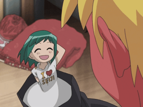 a girl wearing a shirt that says i heart seiji
