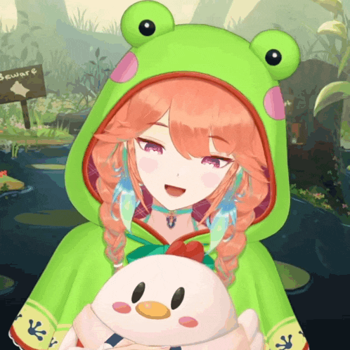 a girl wearing a green frog hood holds a stuffed animal