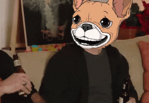 a man sitting on a couch with a dog face on his head