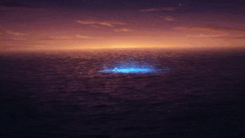 a large body of water with a glowing object in the middle
