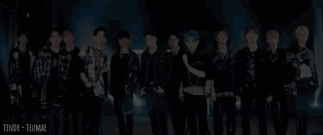 a group of young men standing next to each other with the name tenor-tzuimae written on the bottom