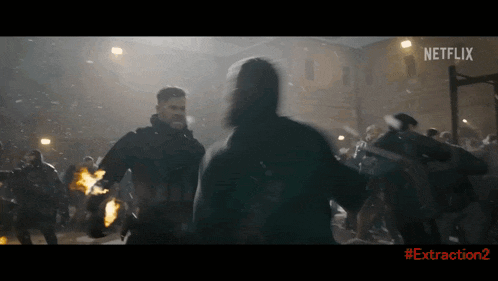 a netflix ad for extraction 2 shows a group of people fighting