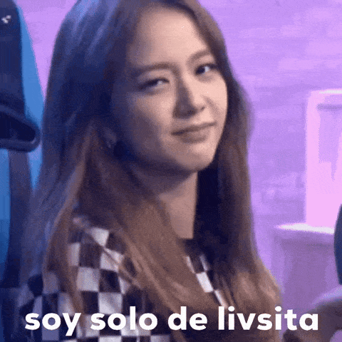 a close up of a woman 's face with the words `` soy solo de livsita '' .