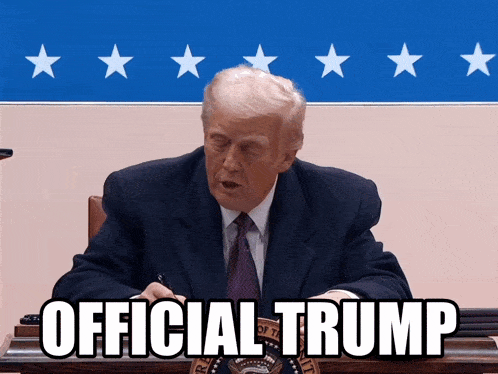 a man in a suit and tie is sitting in front of a wall that says official trump