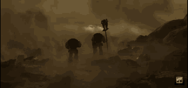 two robots are walking through a desert with a mtv logo on the bottom right