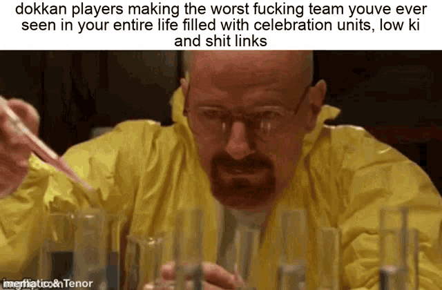 a man in a yellow jacket is sitting at a table with beakers in front of him .