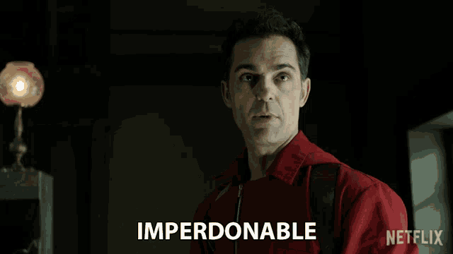 a man in a red shirt has imperdonable written on his chest