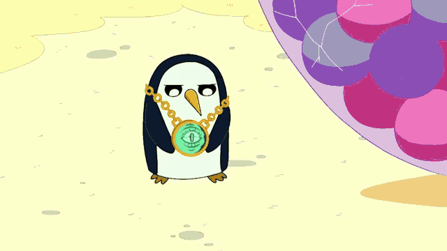 a penguin is holding a gold necklace with a green coin on it