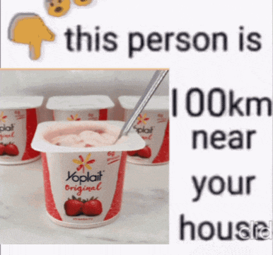 a cup of yoplait original yogurt with a spoon