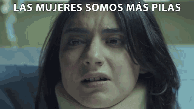 a woman with a collar around her neck has the words las mujeres somos mas pilas above her