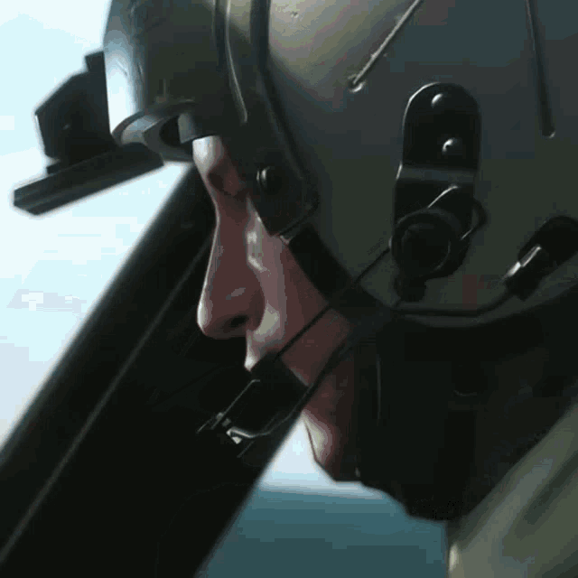 a man wearing a helmet with a microphone on it