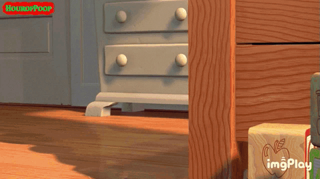a screenshot of a toy story scene with a red sticker that says boukoppoop