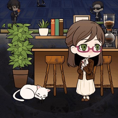 a girl with glasses stands in front of a counter with a cat laying on the floor