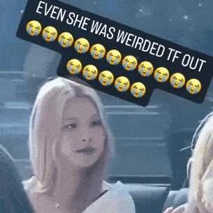 a picture of a woman with a sign that says even she was weirded tf out