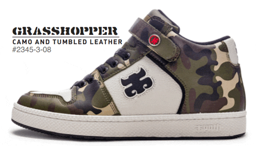 a pair of camo and tumbled leather sneakers