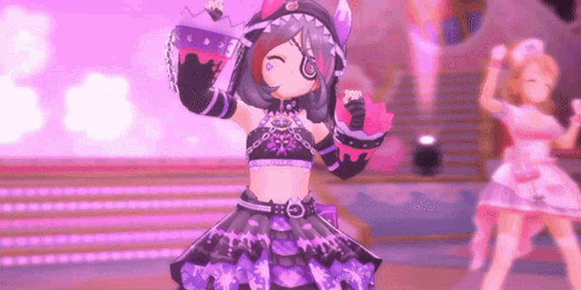 a girl in a purple dress is dancing on a stage with another girl .