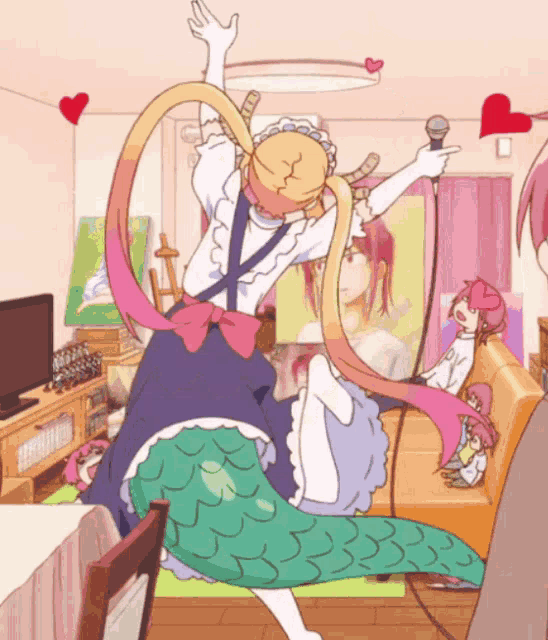 a girl in a maid outfit is holding a microphone in a living room