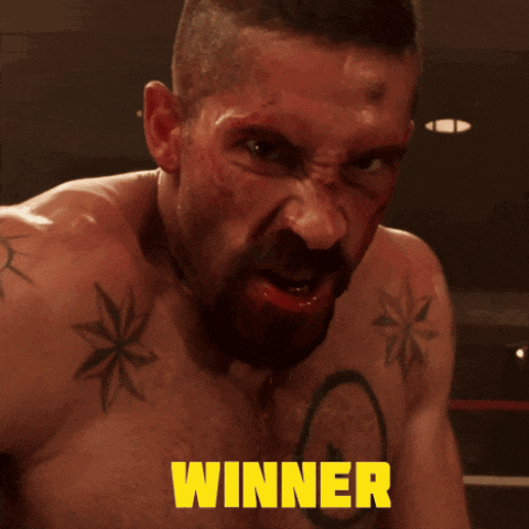 a close up of a man 's face with the word winner on the bottom