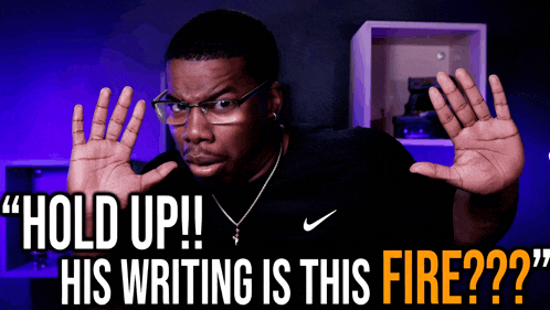 a man wearing glasses and a black nike shirt says " hold up "