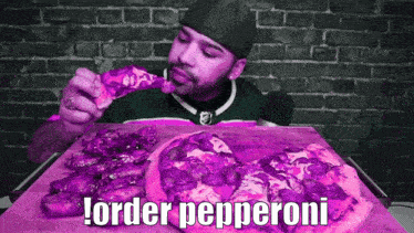 a man is eating a slice of pizza with the words order pepperoni above him