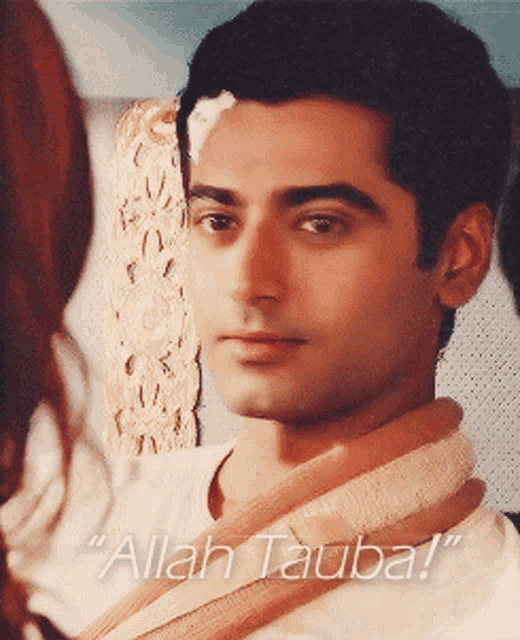 a close up of a man 's face with the words " allah tauba " below him