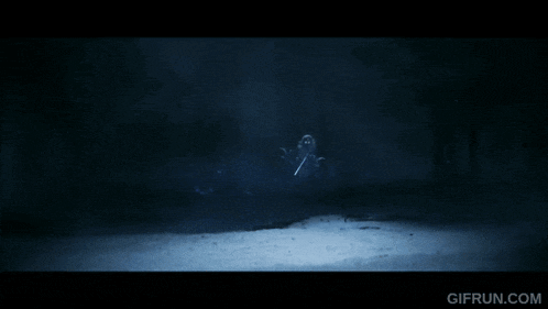 a gif from gifrun.com shows a wolf in the snow