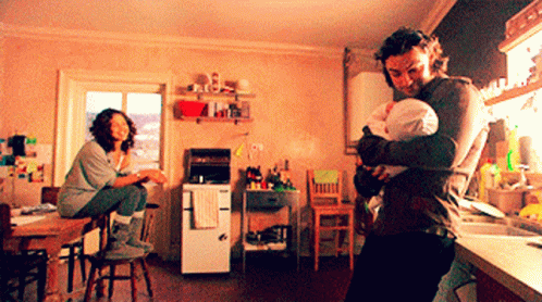 Mitchell And Annie And A Baby Mitchell GIF - Mitchell And Annie And A Baby Mitchell Anna Sayer GIFs