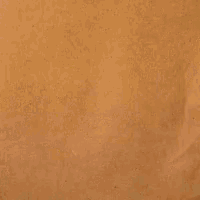 a drawing of the letter p on a brown surface