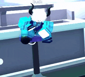 a cartoon character with horns is sitting on a pole with the name buck written on it