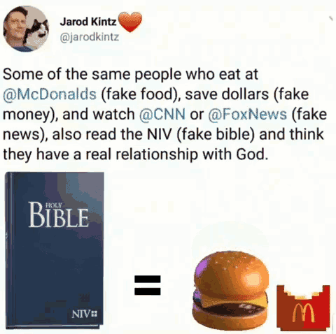 a bible next to a hamburger and a mcdonald 's box