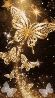 a group of gold butterflies flying in the air