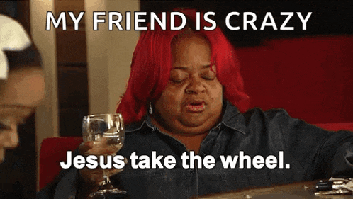 a woman with red hair holds a glass of wine and says " my friend is crazy jesus take the wheel . "