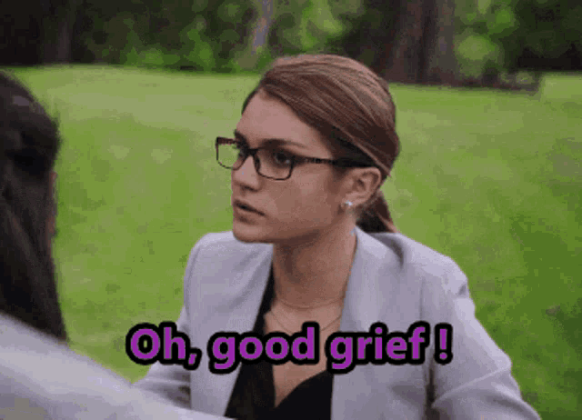 a woman with glasses says oh good grief in pink letters
