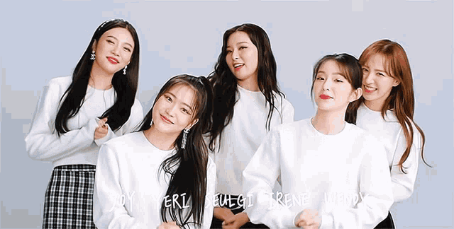 a group of young women are posing for a picture with the names joy eri euegil irene wendy written on the bottom