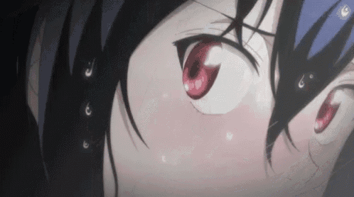 a close up of a person 's eyes with red eyes and black hair