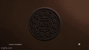 a crunchy oreo cookie with a bite taken out of it .