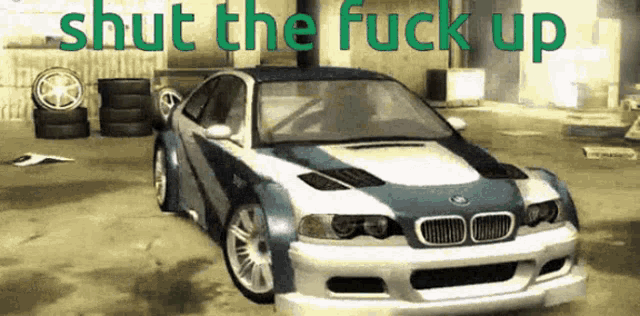a picture of a car with the words " shut the fuck up " written above it