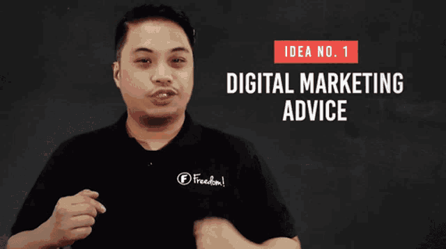 a man wearing a shirt that says " freedom " is giving a digital marketing advice