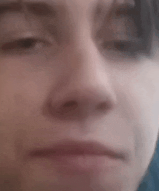 a close up of a person 's face with their eyes closed and their nose visible .