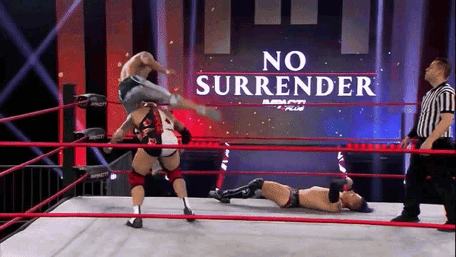 a wrestling ring with a sign that says " no surrender "