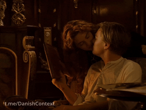 a picture of a man and woman kissing with the words t.me/danishcontext below it