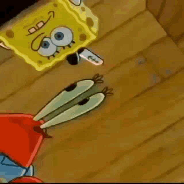 a hamster wearing a red and white wig is looking at spongebob