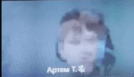 a blurry picture of a person 's face with the name artem t. on the bottom