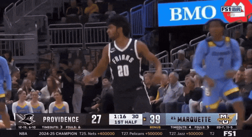 a basketball game between providence and marquette with a score of 39 to 27