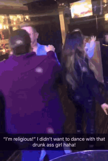 a man says " i 'm religious " while standing next to a woman