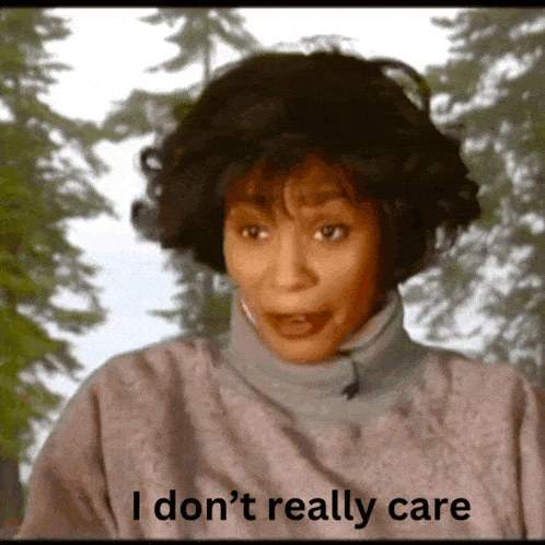 a woman says i don 't really care in front of a forest