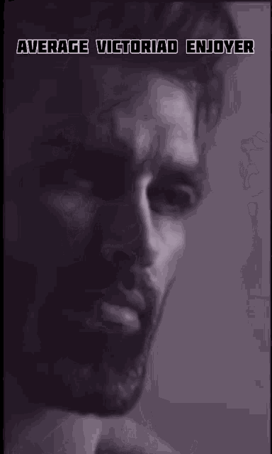 a man with a beard and the words average victoriad enjoyer