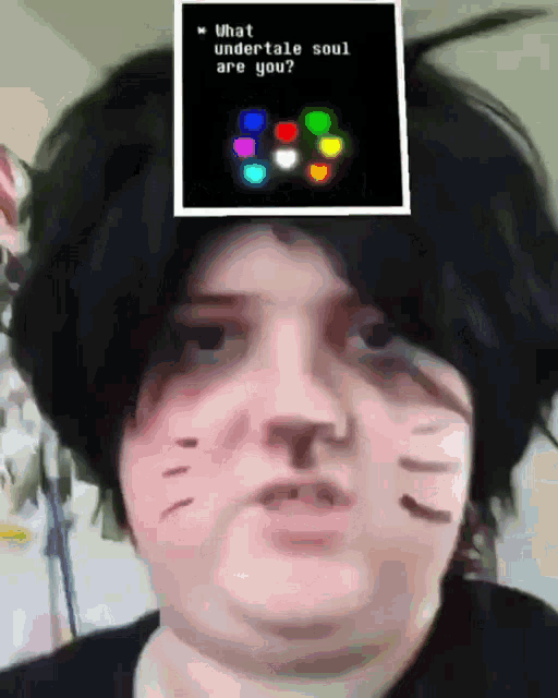 a person is wearing a cat costume and has a picture on their head that says what undertale soul are you