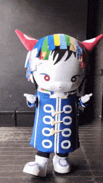 a mascot wearing a blue and white outfit with the number 8888 on the front