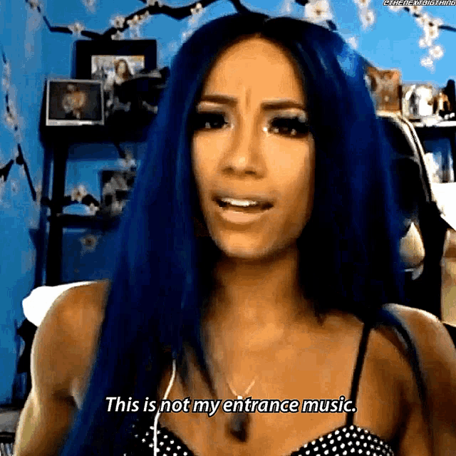 a woman with blue hair says this is not my entrance music .